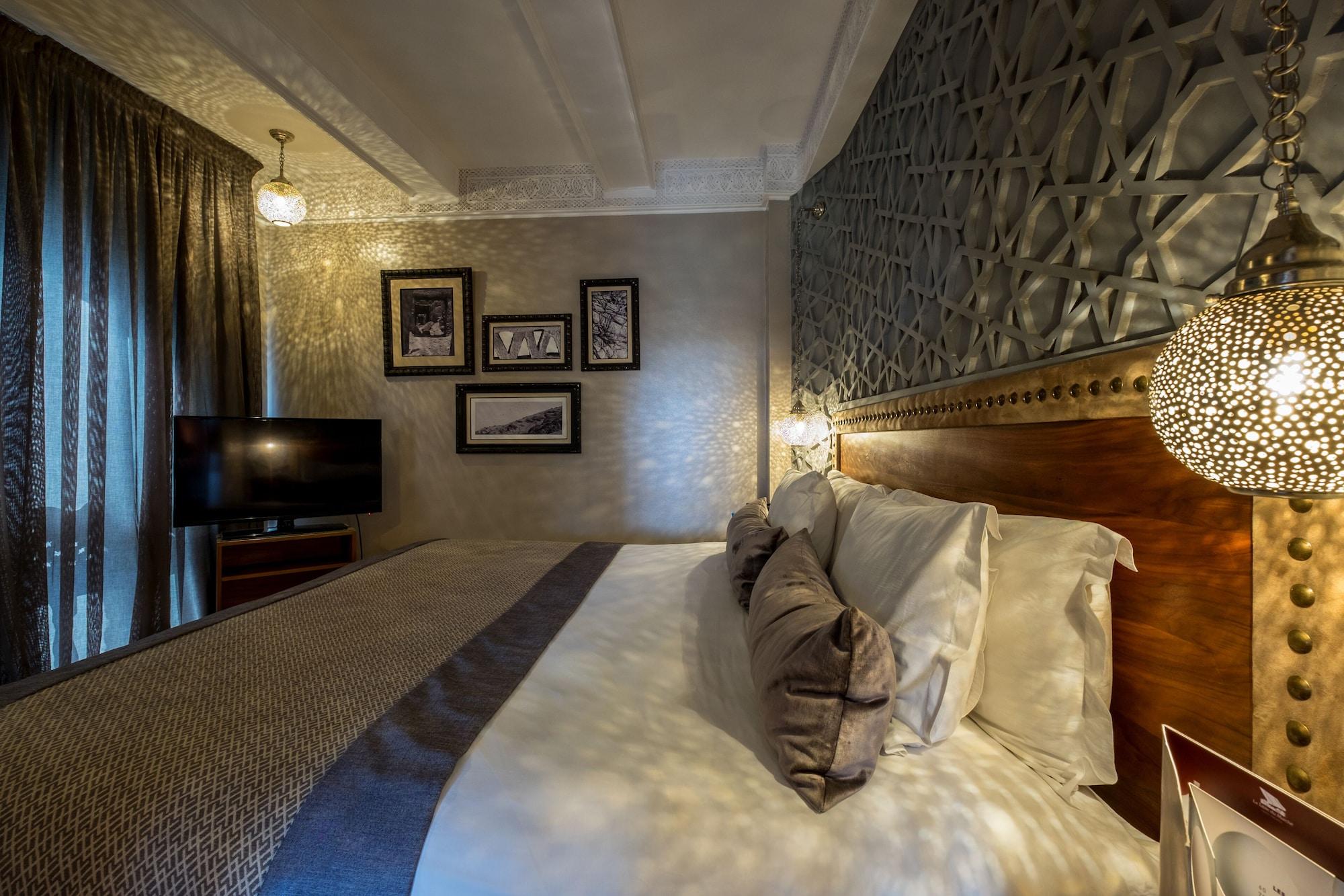 Hivernage Hotel & Spa Marraquexe Exterior foto A bedroom at the hotel